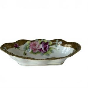 Antique Nippon hand-painted porcelain celery dish with roses and gold trim.